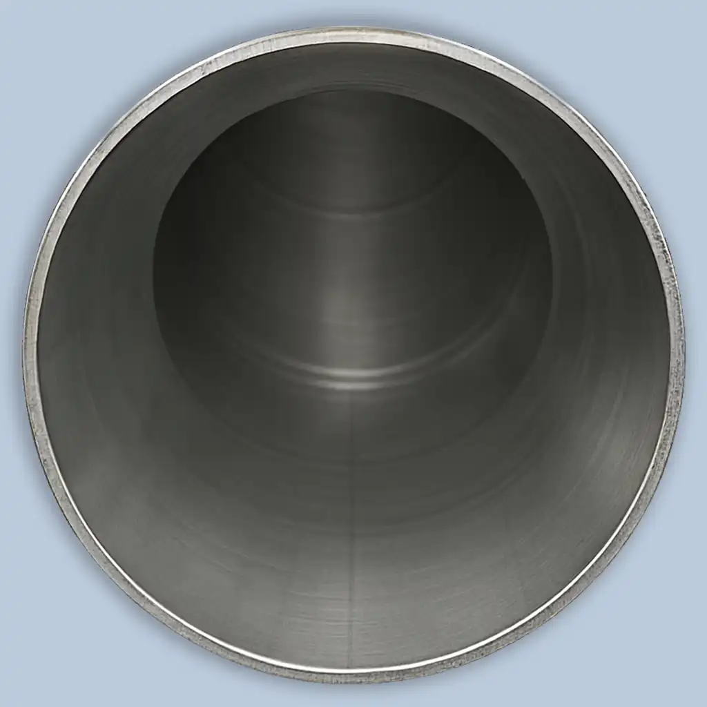 Cutaway view of a marine wastewater pipe fully cleaned of scale, showing smooth interior walls after professional black and grey water pipe descaling.