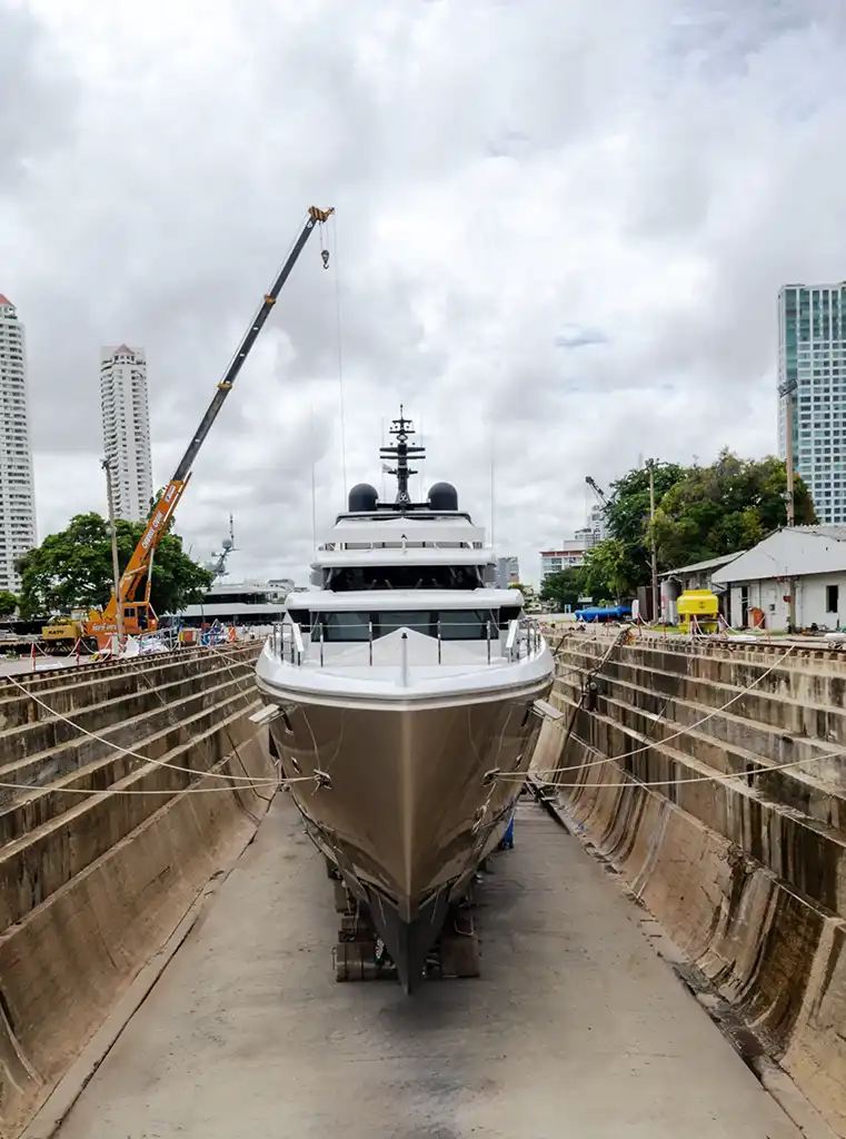 Superyacht in dry dock at Bangkok Dock Company for maintenance and refit services by Clearvac Engineering Asia