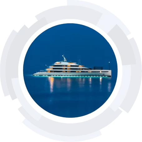 M/Y Savannah M/Y Savannah on a deep blue ocean at night, lights flickering against the water